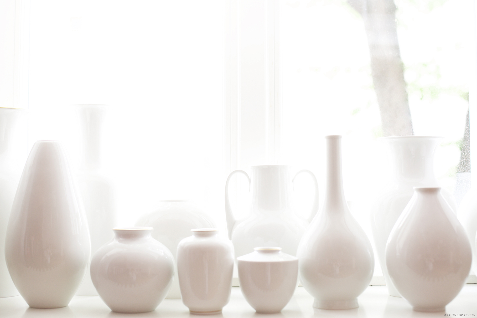 A collection of white vases 
